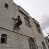 نصب سنگ ریخته نما و پیچ و رولپلاک نمای ساختمان 
