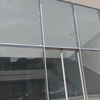 نمای شیشه ای کرتین وال با شیشه سکوریت و درب اتوماتیک 